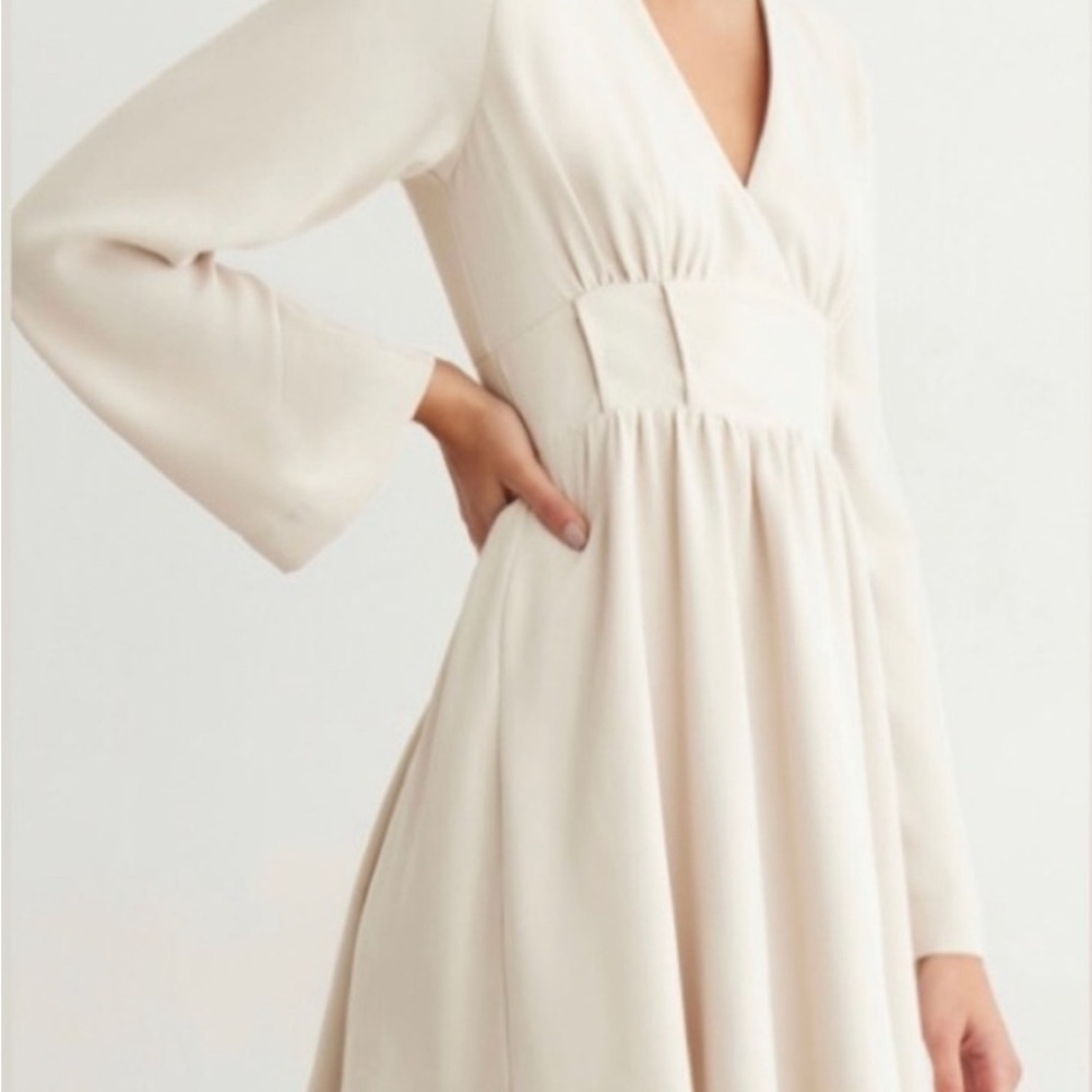 Dynamite Cream Babydoll Dress with Bell Sleeves and V-Neck